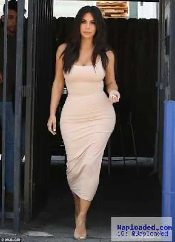Photos: Kim Kardashian shows off her derriere and post-baby body in skintight outfit